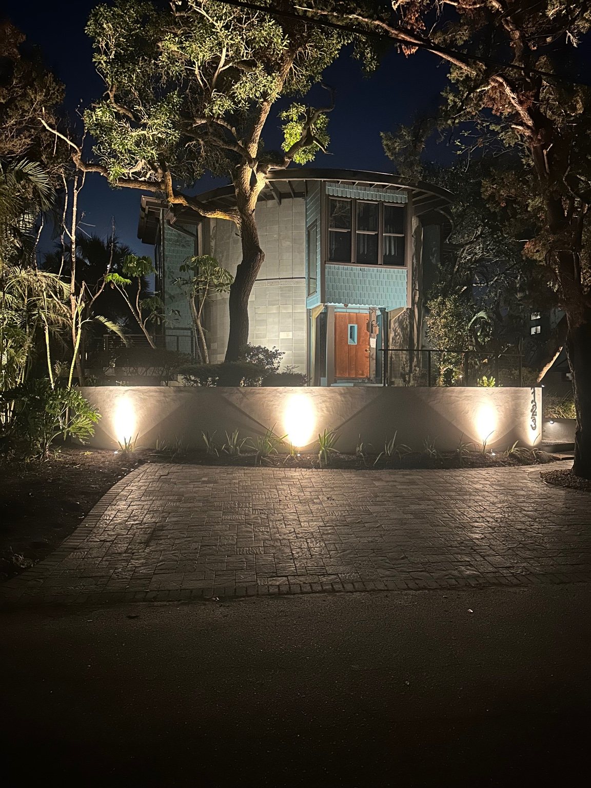 Architectural landscape lighting on a modern Sarasota home